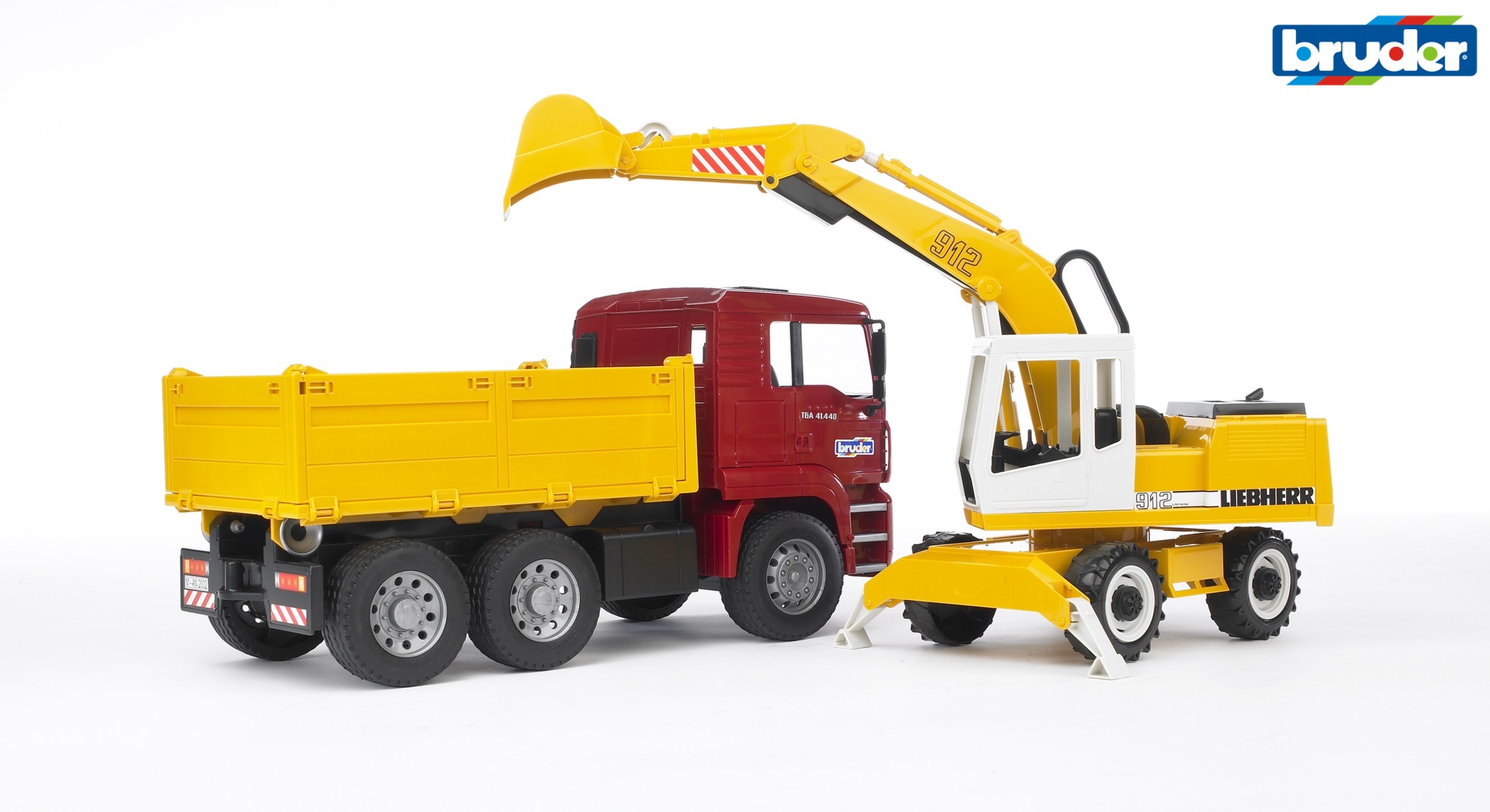 Bruder MAN TGA + ekskavaator, 1:16